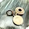 charm pandora pendant double o couronné pavé scintillant