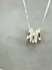 collier agatha en argent avec pendentif à cinq anneaux alignés argent 925 millième (22 ct) 5,62g