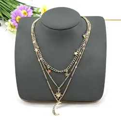 collier multi-rangs aux mailles variées en métal doré