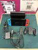 console nintendo switch (modèle oled) avec manettes joy - con bleu néon/rouge néon
