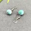 fbo-lari boucles d’oreilles pendantes boule en larimar