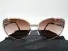 lunettes de soleil chanel camélia 4187 c.395/3b monture en métal doré et acétate écaille, verres marron dégradé