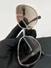 lunettes de soleil chanel camélia 4187 c.395/3b monture en métal doré et acétate écaille, verres marron dégradé