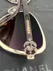 lunettes de soleil chanel camélia 4187 c.395/3b monture en métal doré et acétate écaille, verres marron dégradé