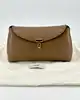 mini pochette toteme t-lock en cuir taupe