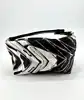 mini sac à main vintage emilio pucci en soie noir et blanc