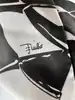 mini sac à main vintage emilio pucci en soie noir et blanc