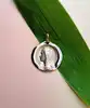 pendentif profile de la vierge marie or jaune signé a. augis or 750 millième (18 ct) 4,52g