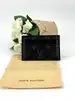 porte-cartes double louis vuitton en toile monogram éclipse et cuir noir