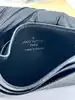 porte-cartes double louis vuitton en toile monogram éclipse et cuir noir