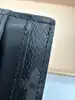 porte-cartes double louis vuitton en toile monogram et cuir noir