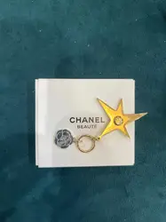 porte clé chanel fleur + étoile