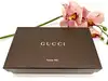 portefeuille zippé gucci en cuir verni rose avec pendentif bambou
