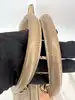 sac à main chloé baylee en cuir bicolore beige et coral à bandouliè réglable entre 97-117 cm