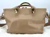 sac à main chloé baylee en cuir bicolore beige et coral à bandouliè réglable entre 97-117 cm