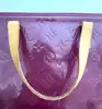 sac louis vuitton bellevue en cuir verni prune