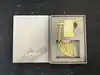 briquet st dupont collier doré k27067ch
