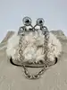 mini sac fourré max mara weekend fluffy pasticcino bag nano blanc avec bandoulières chaîne et mousqueton