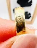 bague style chevalière en or centré d'un rubis synthétique entouré de 10 diamants or 750 millième (18 ct) 5,60g