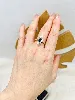 bague marquise centrée d'un saphir taille navette entouré de petits diamants or 750 millième (18 ct) 3,87g