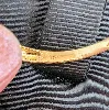 bague or centrée d'un rubis dans une pavage de petits diamants or 750 millième (18 ct) 2,69g