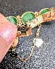 bracelet articulé en or orné de 5 jades ovales en cabochon or 585 millième (14 ct) 21,15g