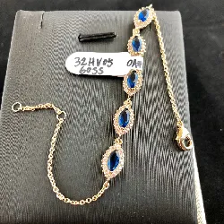 32hv0560ss bracelet pl/or avec pierre bleu forme amande entourage cz