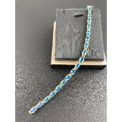 bracelet rivière topazes bleues et diamants or 750 millième (18 ct) 17,25g