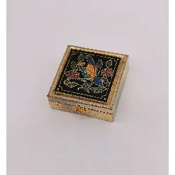 boîte à bijoux dorée ornée d'un motif oiseau