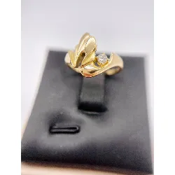 bague or stylisée ornée d'un diamant env 0,08ct or 750 millième (18 ct) 3,38g