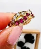 bague us ornée de 20 diamants et rubis forme tressé or 750 millième (18 ct) 6,36g