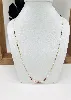 collier maille gourmette centré de 3 rubis navettes et 4 perles de culture or 750 millième (18 ct) 2,26g