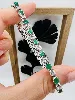 bracelet or blanc orné de 19 diamants evr 2,28ct alternés de 19 emeraudes or 750 millième (18 ct) 16,71g
