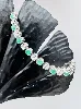 bracelet or blanc orné de 19 diamants evr 2,28ct alternés de 19 emeraudes or 750 millième (18 ct) 16,71g