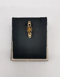 broche plaqué or centré d'une ambre ovale
