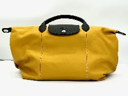 longchamp le pliage porte main m en cuir bicolore avec bandoulière