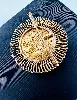 pendentif/borche orné d'une pièce de 20 francs louis xviii or 750 millième (18 ct) 11,19g