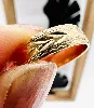 bague aliiance or avec motifs limés or 750 millième (18 ct) 3,56g