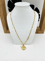 collier guess coquillage et perle