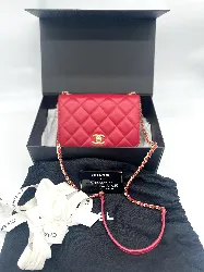 mini sac à rabat chanel en cuir de veau matelassé couleur rose foncée