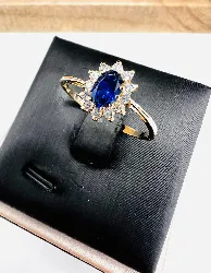 bague marguerite en or pierre bleue entourée de 12 oxydes or 585 millième (14 ct) 1,69g