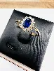 bague marguerite en or pierre bleue entourée de 12 oxydes or 585 millième (14 ct) 1,69g