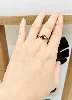 bague or rose centrée d'une pierre rouge or 750 millième (18 ct) 1,94g