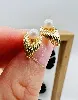 boucles d'oreilles en or chacune ornée d'une perle de culture or 750 millième (18 ct) 1,39g