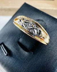 bague fine en 2 ors centrée d'un petit diamant or 750 millième (18 ct) 1,41g