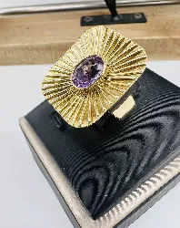 bague rectangulaire motif rayonnant centrée d'une améthyste (rayée)  or 585 millième (14 ct) 7,71g
