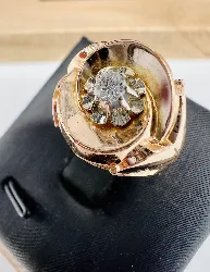 bague tourbillon centrée d'un diamant taille brillant d'environ 0,15ct or 750 millième (18 ct) 3,81g