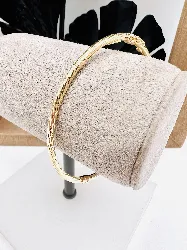 bracelet jonc ouvrant en or motif tressé or 750 millième (18 ct) 4,59g