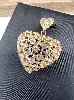 pendentif coeur motifs vidés orné des oxydes roses or 750 millième (18 ct) 7,05g