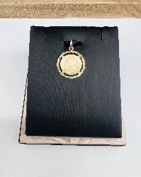 pendentif coran forme rond or 750 millième (18 ct) 2,32g